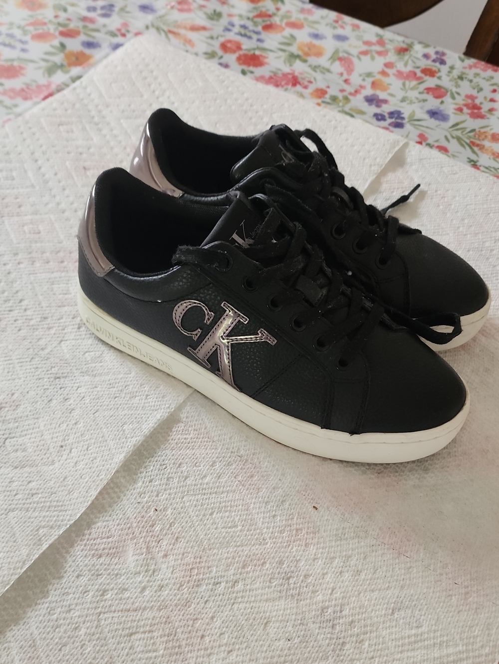 Calvin Klein Black Sneakers with Metallic Rose Accent